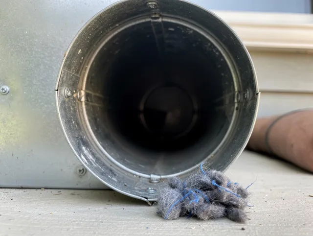 West Rancho Dominguez Dryer Vent Cleaning technician using specialized equipment to clear severe dryer vent blockage in West Rancho Dominguez
